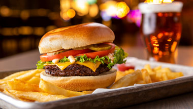 burger with fries and beer