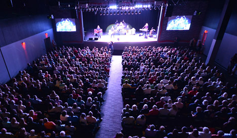 Event Center Stage with a crowd of people