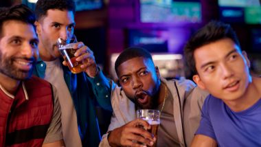 Guys in ESPN BET watching a game