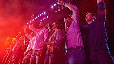 people dancing at a concert