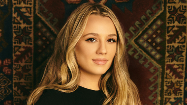 Gabby Barrett with gold background