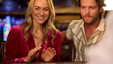 Man and woman playing at a table