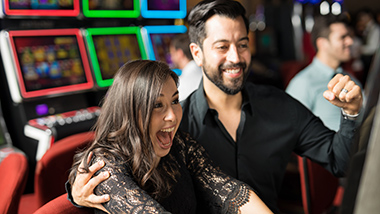 people winning at a slot machine